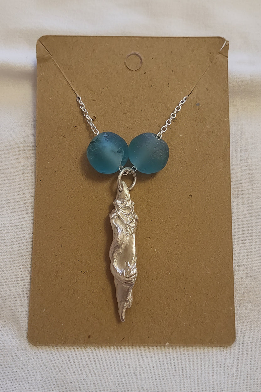 Fine silver handmade mermaid pendant on a sterling silver chain, accented with recycled Ghana glass beads.