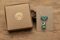 Authentic North East English coastal turquoise sea glass pendant, cradled in a sterling silver wrap and accented with Ghana glass beads on a sterling silver chain